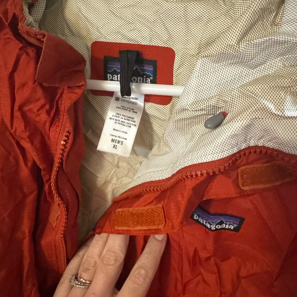 Patagonia Men's XL burnt orange packable rain jacket